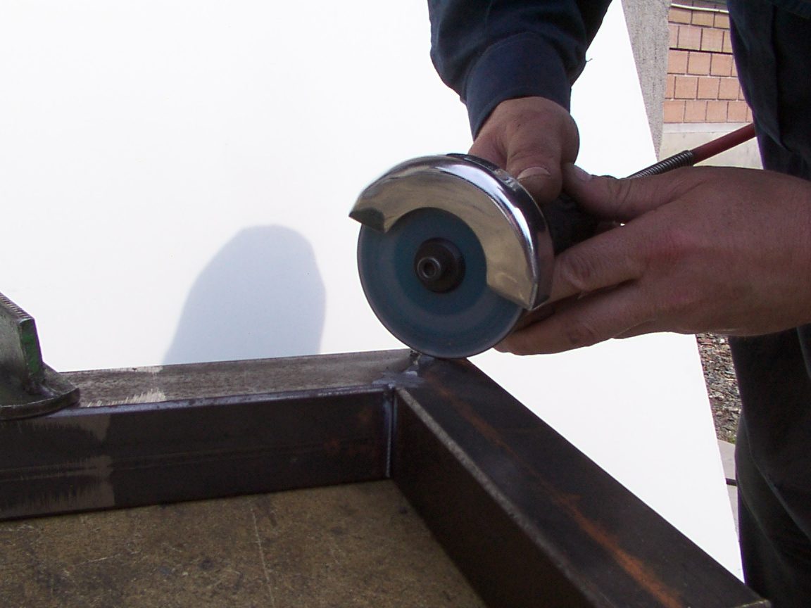 At work: grinding a frame